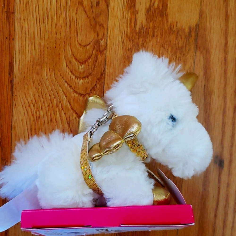 Justice white and gold unicorn 🦄 Pet Shop.  Great party favors.